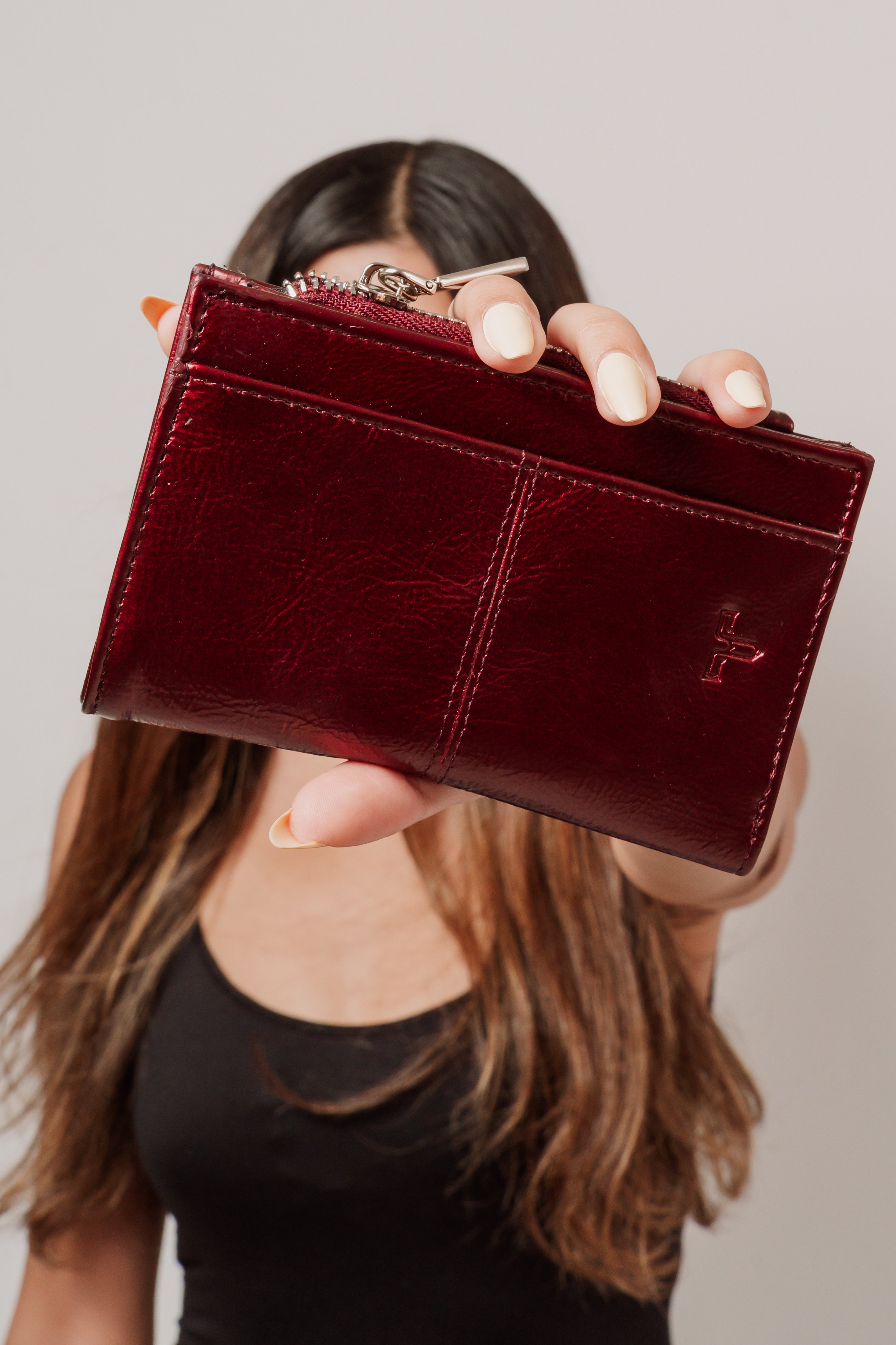 Cartera de piel Odet Guinda